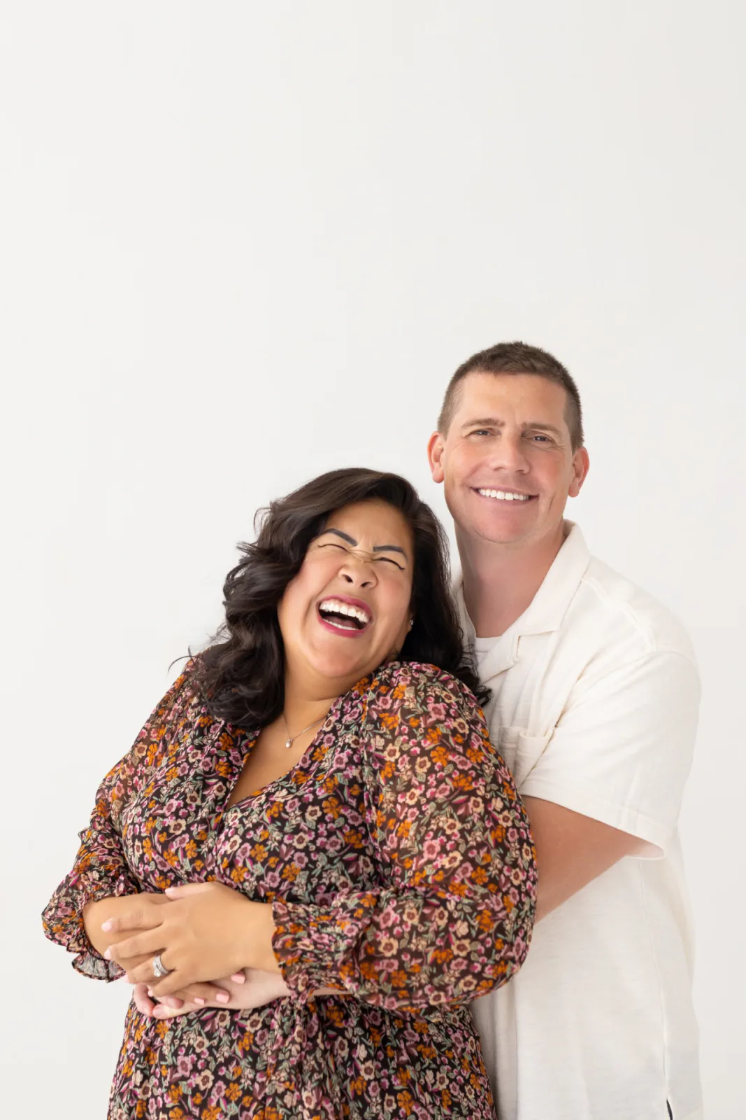 Flor De Maria McNally laughing with her husband