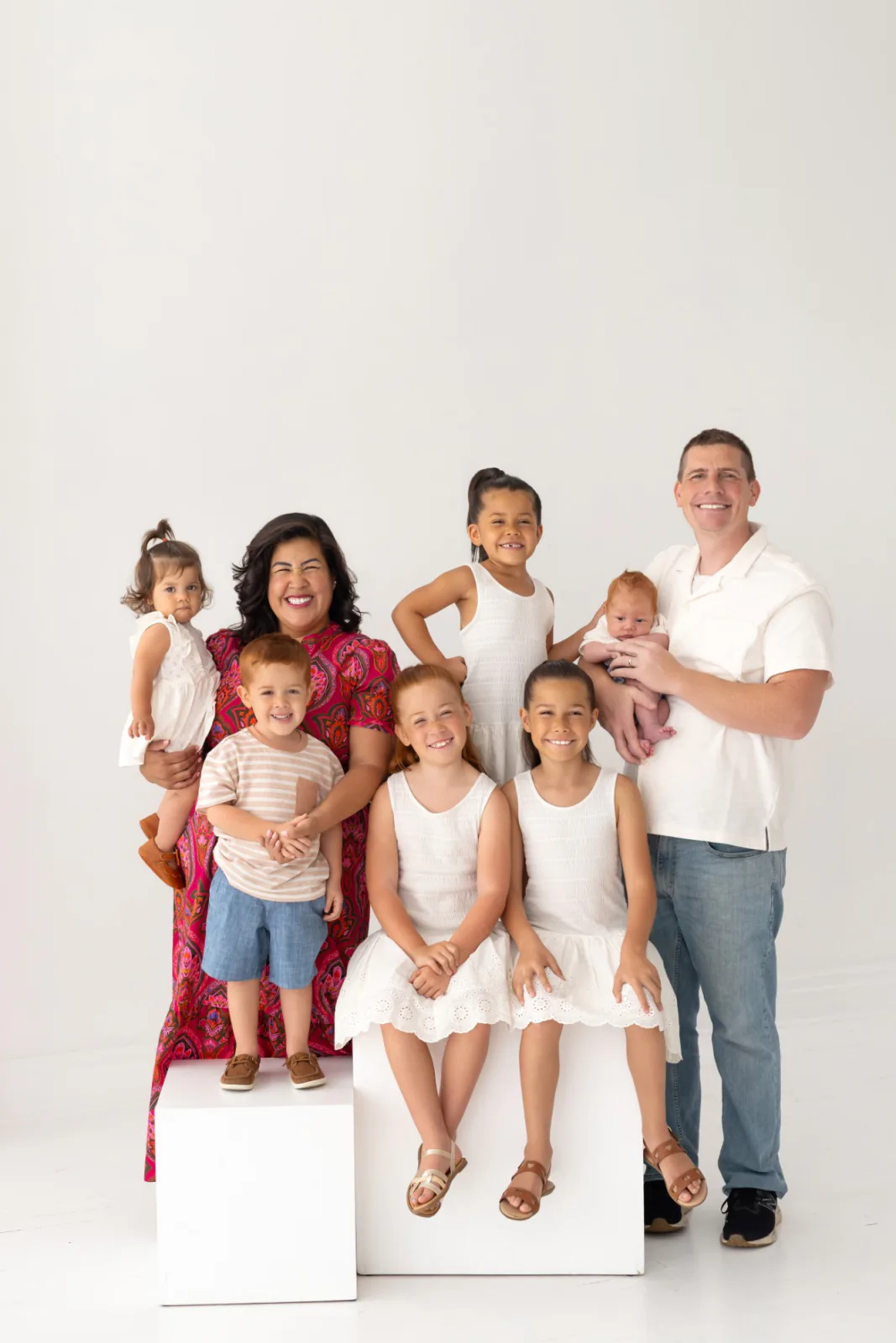 Flor De Maria McNally with her husband and six children