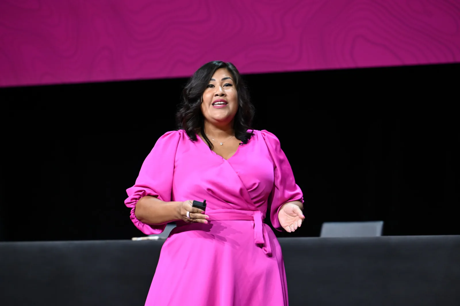 Flor De Maria McNally presenting on stage